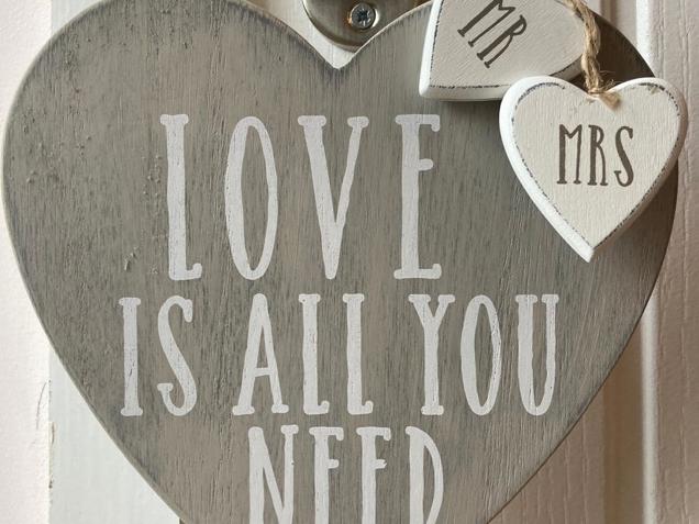 'Love is all you need' hanging sign image